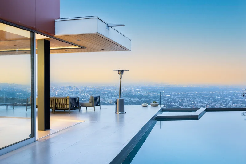 infinity pool of a mansion in LA overlooking Hollywood making it the best Los Angeles Airbnb